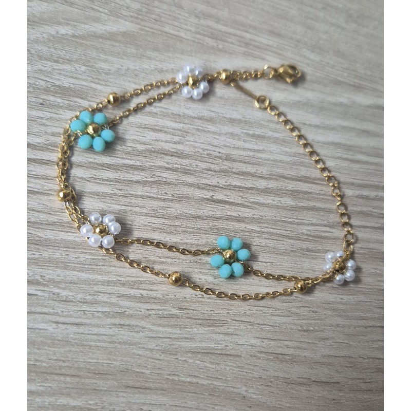 Pulsera flor turquesa y oerlas